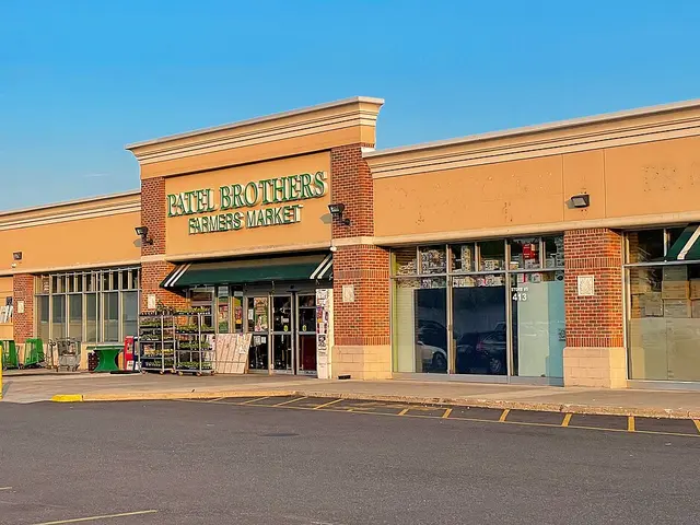 Exterior storefront of Patel Brothers Farmers Market, an Indian grocery store in Hicksville, New York.