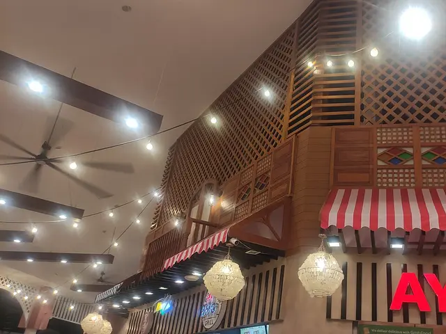 Detailed view of the heritage-inspired facade of Ayer's Restaurant.