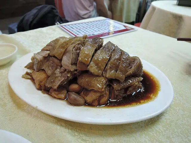 A goose meat platter served with bean curd and peanuts, Cantonese style.