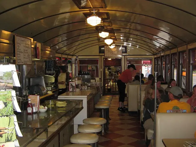 Interior of the 1938 Wellsboro Diner in Wellsboro, Pennsylvania, showing booths and a counter.