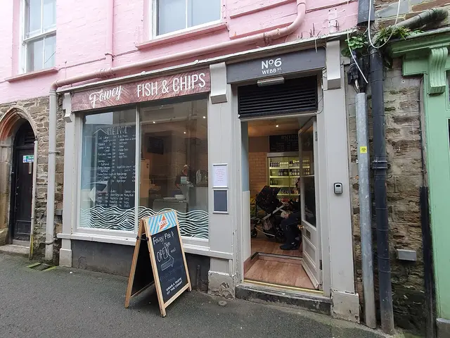 Exterior of a small fish and chip takeaway shop.