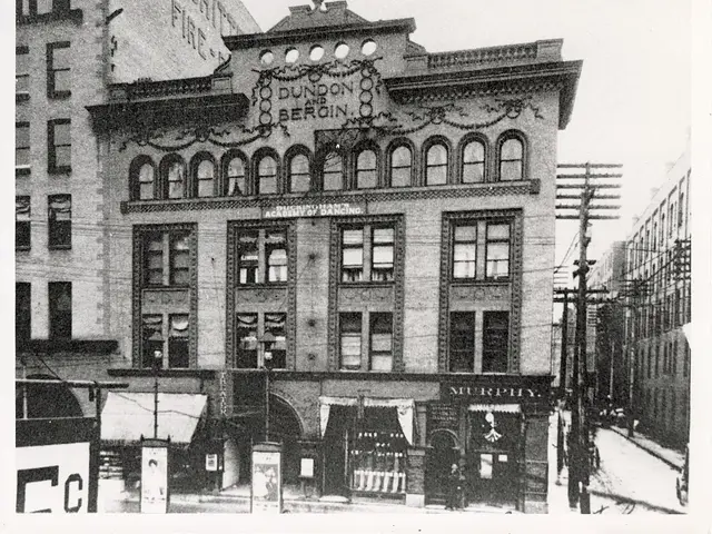 A historic black-and-white photograph of the ornate multi-storey building that housed Buckingham's Academy of Dancing.