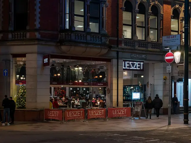 Exterior signage and storefront of a Turkish restaurant on a city street corner.