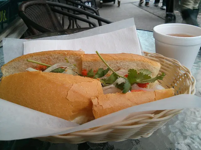 A meatball banh mi sandwich from a Vietnamese restaurant.