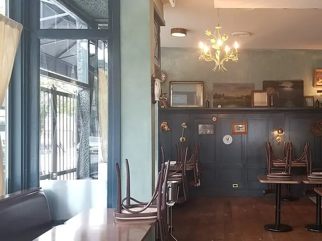 The dining area of St. Lawrence restaurant in Vancouver, British Columbia, with tables set for guests.