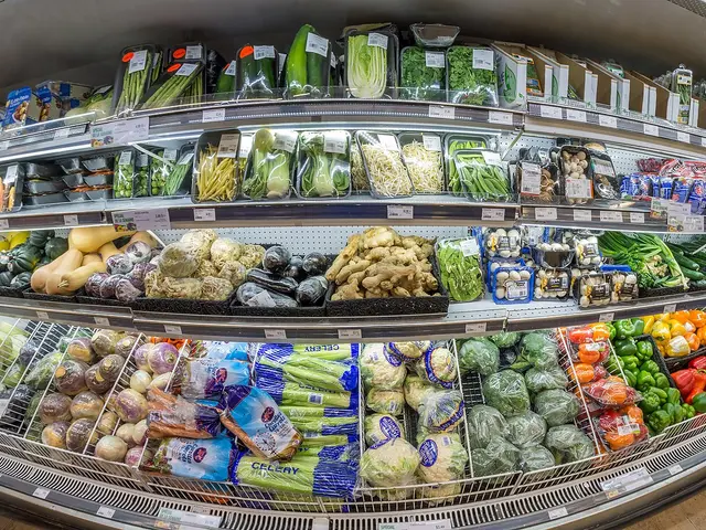 Fresh produce shelves stocked with fruits and vegetables inside a supermarket in Quebec City.