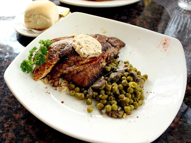 A chef's special fish dish plated at a restaurant.