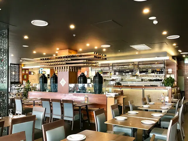 The interior seating area of a Chinese restaurant.
