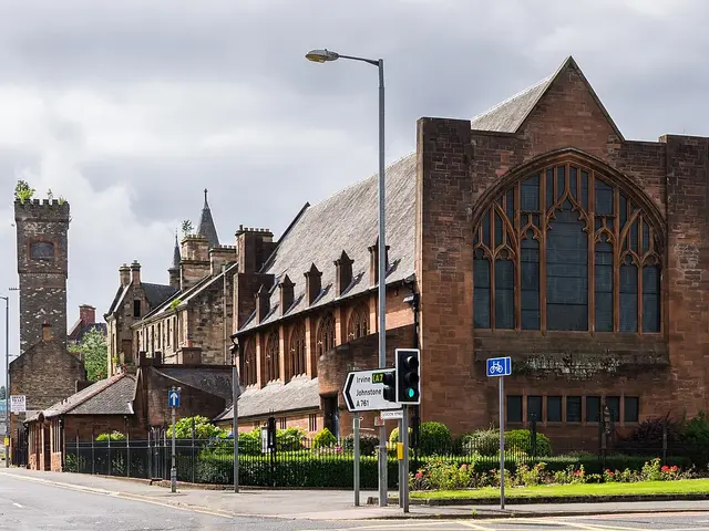 Exterior of St Matthew's Church, a red sandstone church building in Paisley, Scotland.