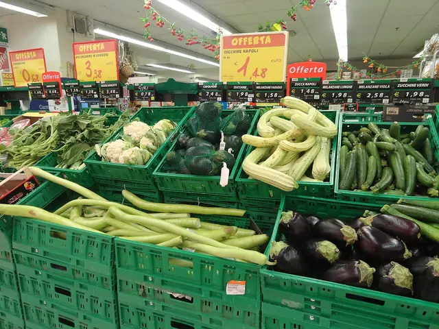 Crates of zucchini, cucumbers, eggplant and other fresh vegetables on display in a Sicilian grocery store