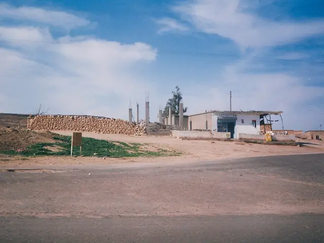 The exterior of a small roadside grocery store.