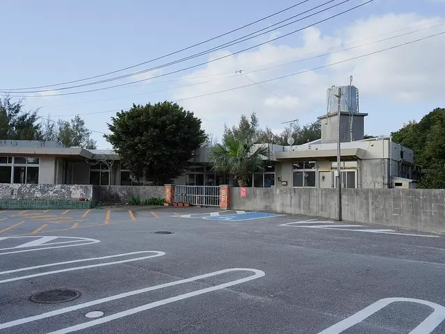 The single-storey exterior of Iheya Nursery School on Iheya Island, Okinawa Prefecture, Japan.