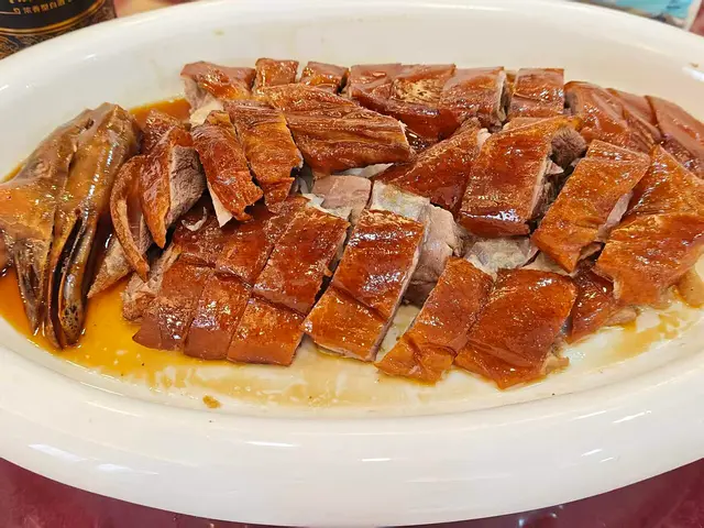 Sliced Cantonese roast goose served on a plate at a restaurant in Guangzhou.